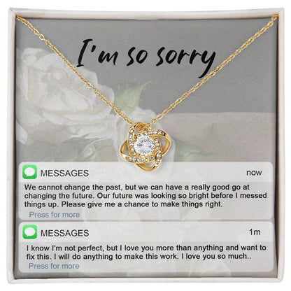 Real time text message apology except on message card together with love knot pendant necklace.