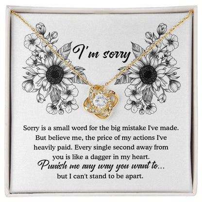 An apology filled with remorse, truly sorry for hurting you message card with love knot pendant necklace.