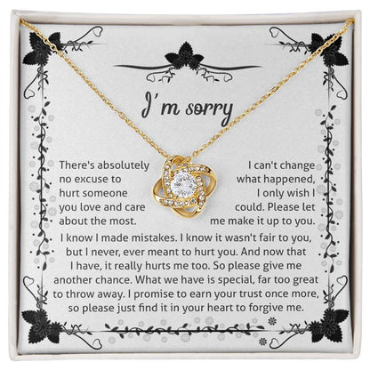 owning my mistake, an apology from the heart, message card with love knot pendant to show regret.