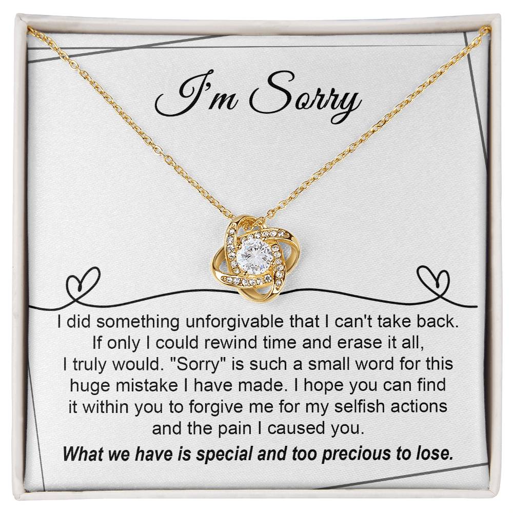 Regrettable mistake, my apologies. Message card with a genuine apology from the heart with a love knot necklace as gift.