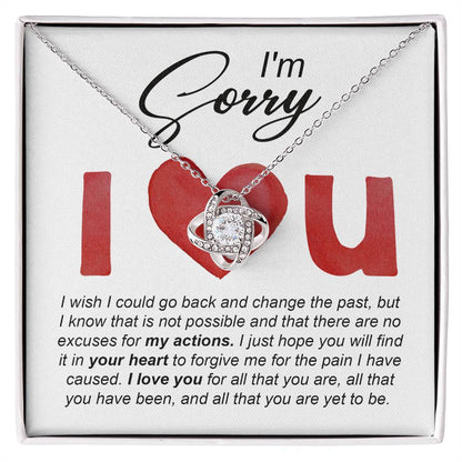 I love you, so sorry I hurt you. Send a message card apology with a heart warming gift, love knot pendant necklace.