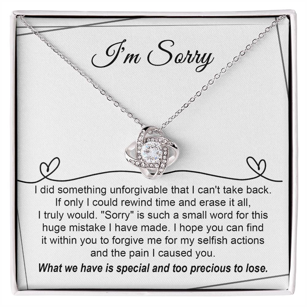 Regrettable mistake, my apologies. Message card with a genuine apology from the heart with a love knot necklace as gift.