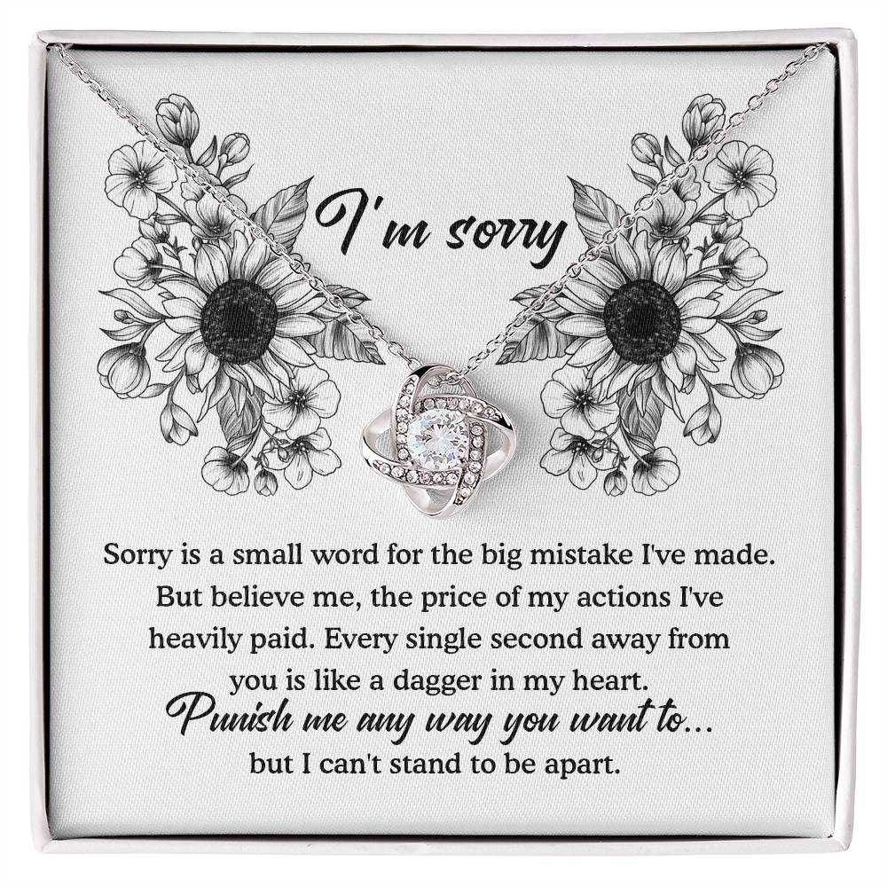 An apology filled with remorse, truly sorry for hurting you message card with love knot pendant necklace.