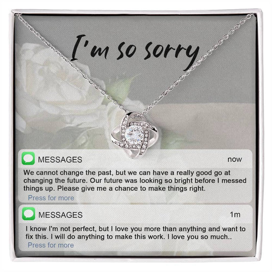 Real time text message apology except on message card together with love knot pendant necklace.