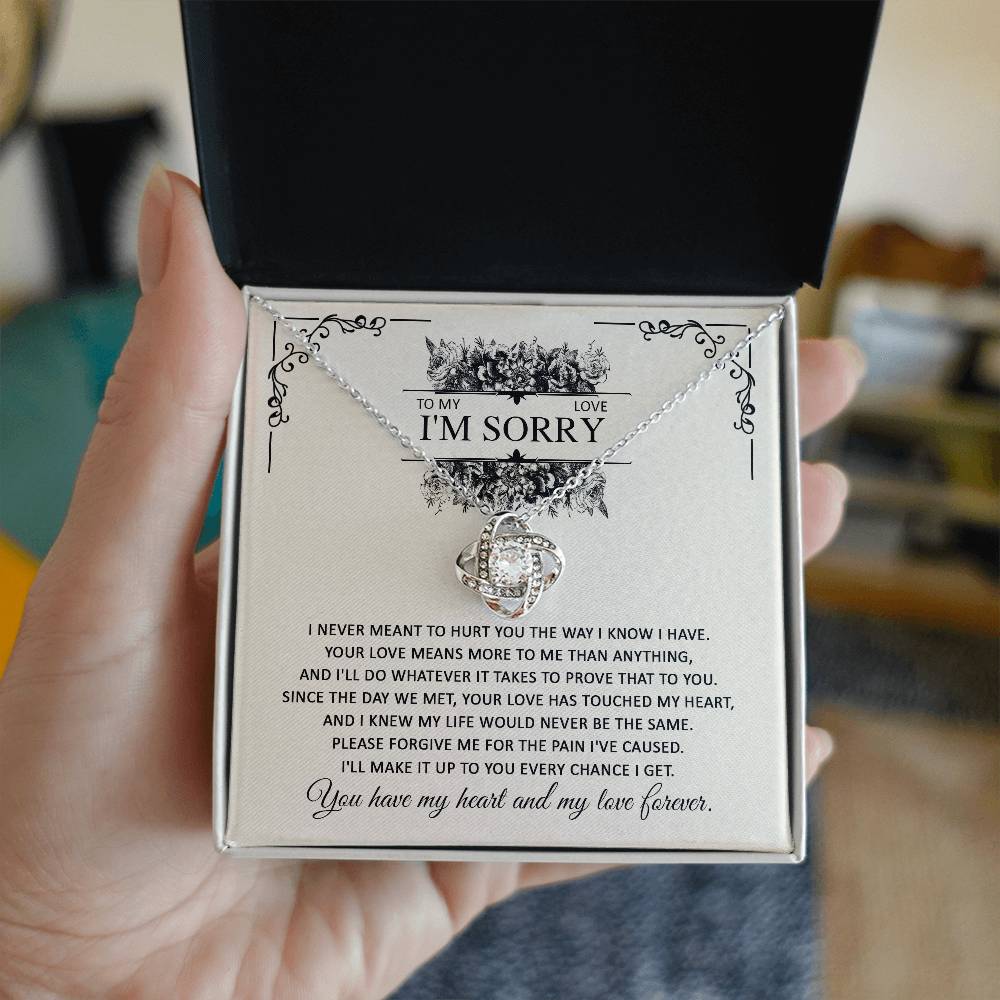 Sorry for hurting you, true and sincere  apologetic letter on message card with love knot pendant necklace.