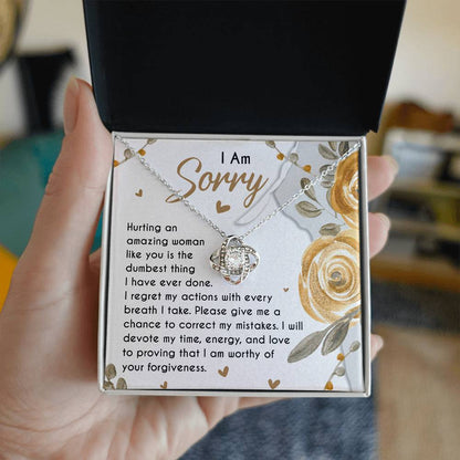 Sorry for hurting you, message card with apology message and a love knot pendant necklace.