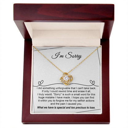 Regrettable mistake, my apologies. Message card with a genuine apology from the heart with a love knot necklace as gift.