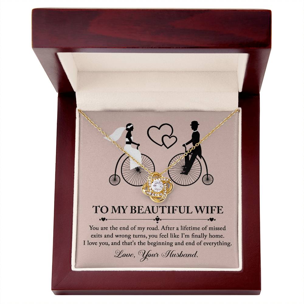 Beautiful message to bride from groom on wedding day, love knot necklace and message card.