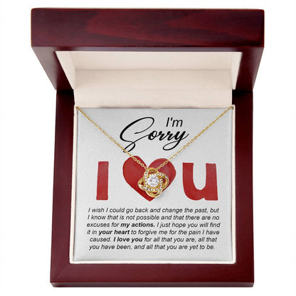 I love you, so sorry I hurt you. Send a message card apology with a heart warming gift, love knot pendant necklace.