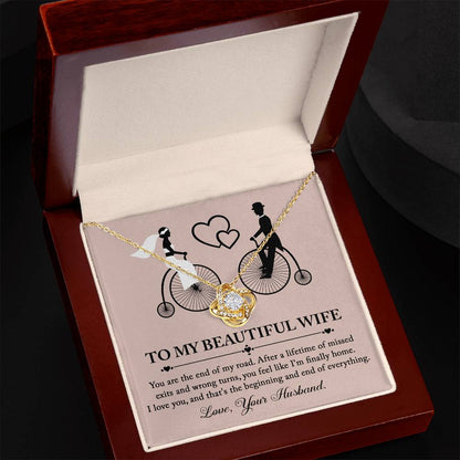 Beautiful message to bride from groom on wedding day, love knot necklace and message card.