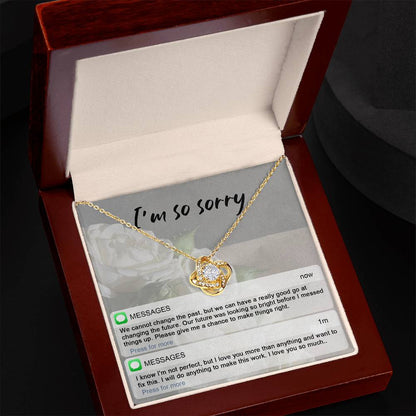 Real time text message apology except on message card together with love knot pendant necklace.