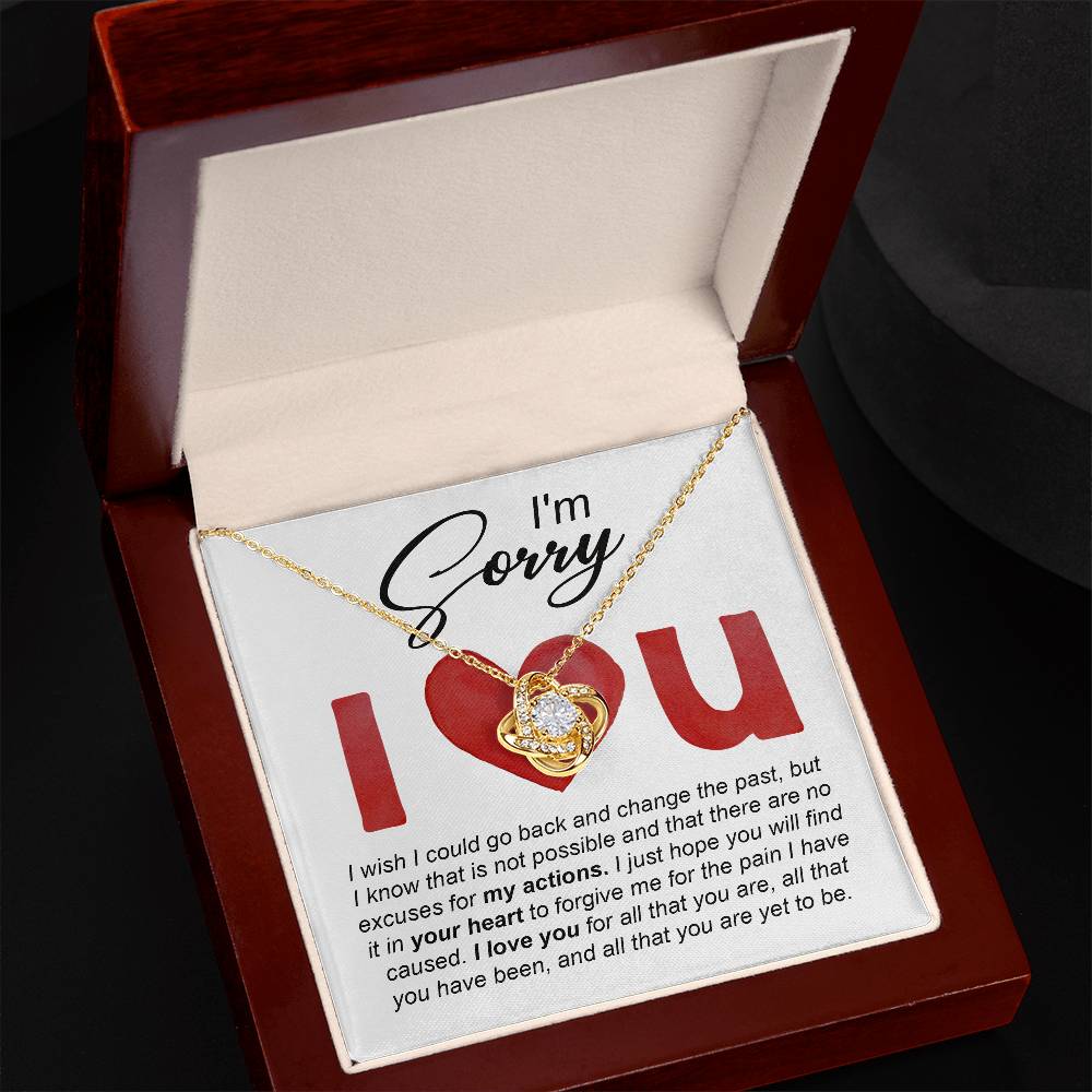 I love you, so sorry I hurt you. Send a message card apology with a heart warming gift, love knot pendant necklace.