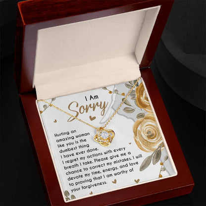 Sorry for hurting you, message card with apology message and a love knot pendant necklace.