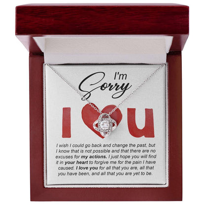 I love you, so sorry I hurt you. Send a message card apology with a heart warming gift, love knot pendant necklace.