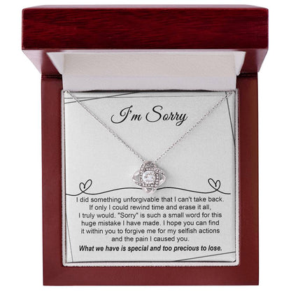 Regrettable mistake, my apologies. Message card with a genuine apology from the heart with a love knot necklace as gift.