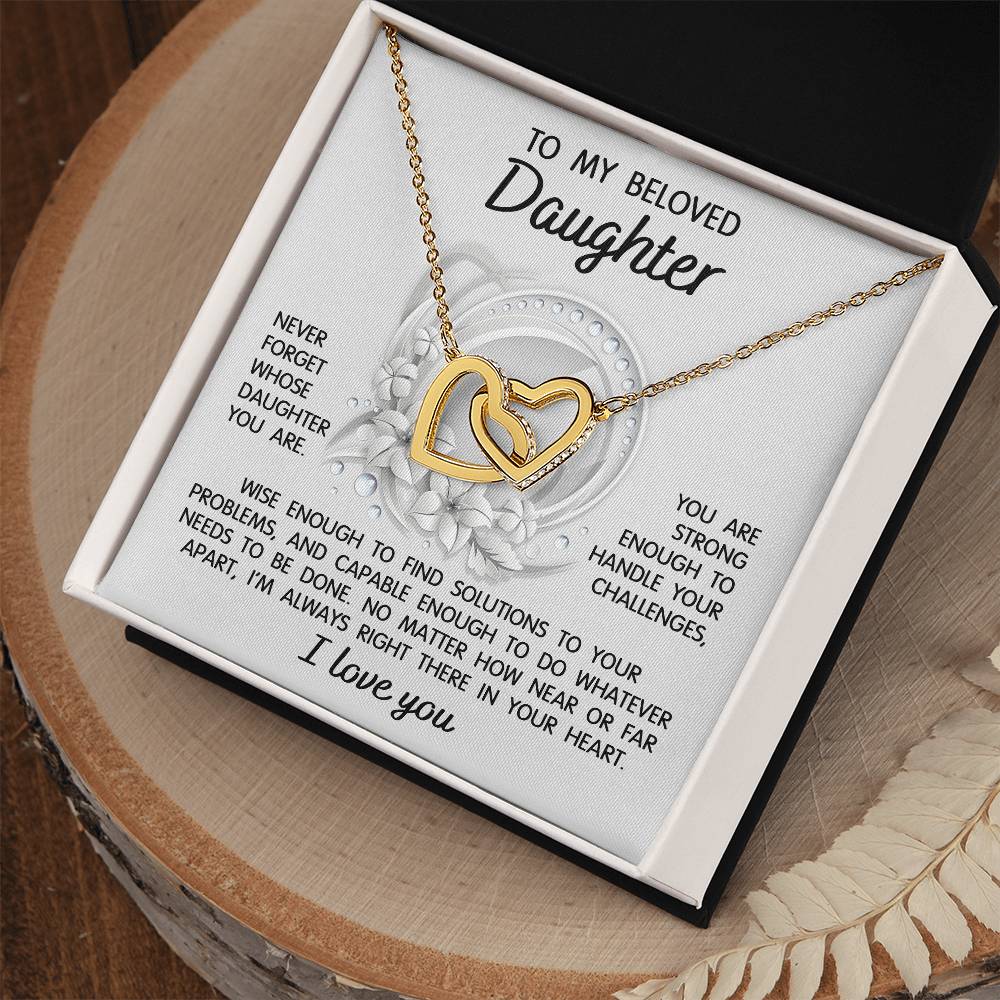 To my beloved daughter on wedding day, gift from mom, dad, bonus parents. Message card with interlocking hearts necklace.