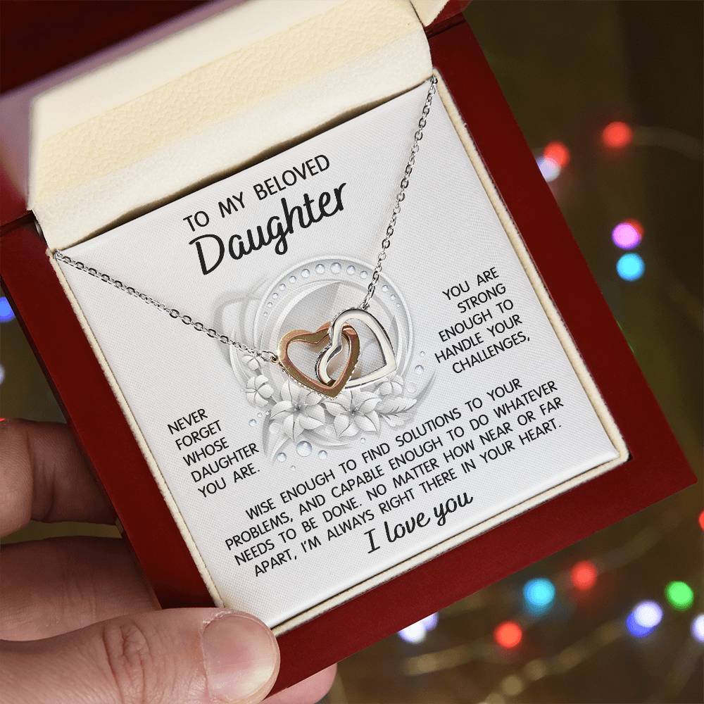 To my beloved daughter on wedding day, gift from mom, dad, bonus parents. Message card with interlocking hearts necklace.