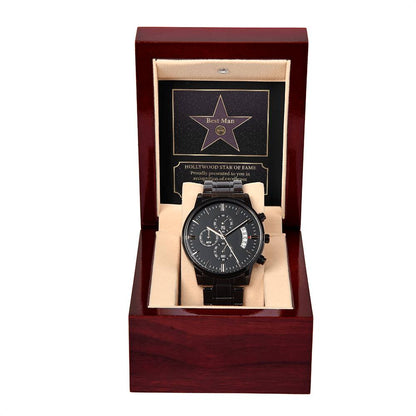 Best man present ideas for him on wedding day, message card in Hollywood star of fame style together with black chronograph watch in stainless steel metal.