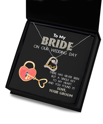 Wedding gift from groom to bride on wedding day, message card with love dancing sterling silver necklace.