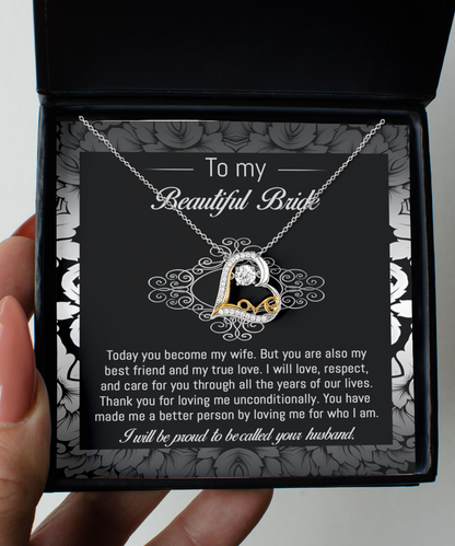 To my beautiful bride, message card with love dancing necklace from proud husband.