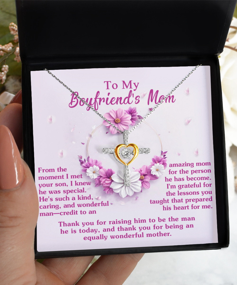 To my boyfriend´s mom - cross dancing necklace for anniversary and birthday present.